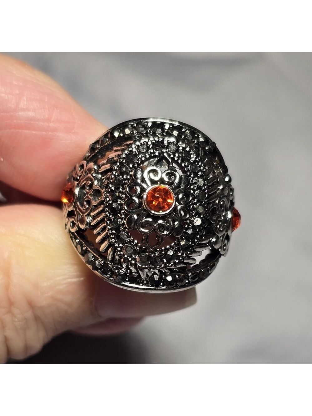 Ornate Silver Ring with Orange Gemstones